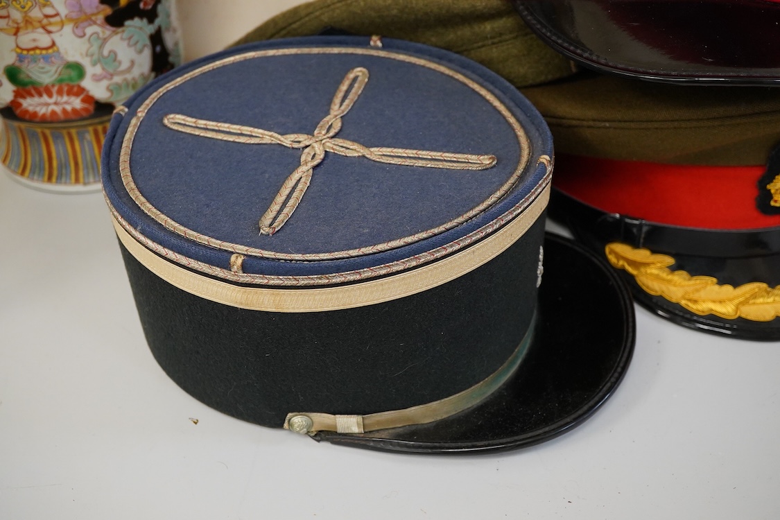 Four various caps, French Gendarme police hat etc